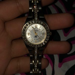 Woman’s Court Quartz Stainless Steel Sport Watch.